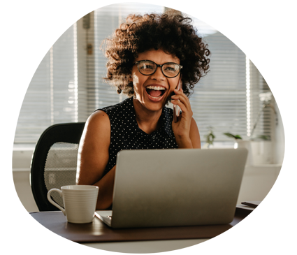 Woman on the phone at her desk